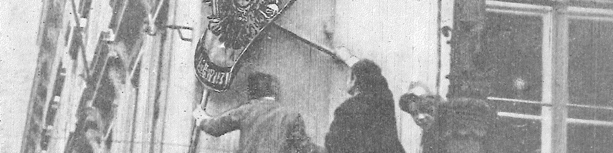Removing_police_seat_sign_in_1918_from_Rosicky Removing_police_seat_sign_in_1918_from_Rosicky